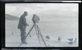 William L. Finley photographing gulls