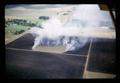 Aerial view of grass stubble burning at Ed Jenks Farm, 1965