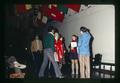 AFS students under flags in Memorial Union Commons, Oregon State University, Corvallis, Oregon, circa 1971