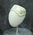 Calot or Capulet style hat of ivory felt with a decorative band of ivory silk velvet trimmed in white twisted cord