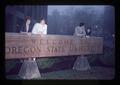 American Field Service (AFS) students with Oregon State University welcome sign, Corvallis, Oregon, 1976