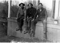 Three men on building's porch --Bob Craig, Ranger J.L.MacKechnie and Bob Waitknicht Forest Assistant