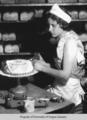 Bakery, Berea College: decorating a cake