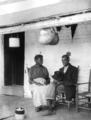 African-American woman and man on porch