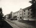 Men outside of Friendly Hall