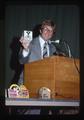 Pet Rock promoter holding Instant Replay stamp box, Corvallis, Oregon, 1977