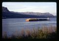 Columbia River with grain barge, Oregon, circa 1973