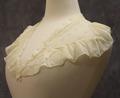 Collar of ivory silk chiffon with tiny floral eyelet embroidery
