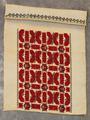 Textile panel (part of a sleeve) of hand-woven flax with center rectangle of embroidered bands in red