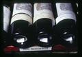 Closeup of wine bottles in Harris Wine Cellar, Oregon, circa 1972