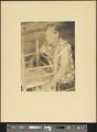 Mary Owenby, caning a chair [b006] [f005] [004a] (recto)
