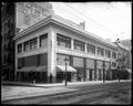 Healy Building at Morrison and Park, Portland. New Republic Grill on second floor. Street in foreground. Sky opaqued.