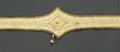 Belt of ecru felt heavily embroidered with metallic gold threads couched in yellow yarns in a decorative paisley and circle designs