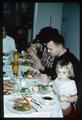 The Robert W. Henderson family at the dinner table, circa 1962