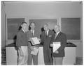 Pharmacy student, Dean Charles Wilson, George Natranga and L. A. Sciuchetti, Fall 1961