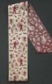Textile band of ecru silk satin damask with burgundy Egyptian motifs and symbols