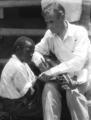 John Jacob Niles with African-American boy with Appalachian dulcimer