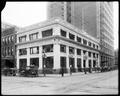 Merchant's National Bank, 4th and Washington, Portland. Realty Co. on second floor. Autos and people on street.