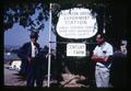 F. C. Reimer and Dr. Porter Lombard with Southern Oregon Experiment Station Hanley Farm sign