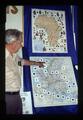 Col Campbell with World "Coin" maps at fair booth, August 1991