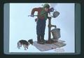 Photo of Norman Rockwell painting of boy pumping water, 1975