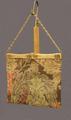 Tapestry bag of woven wool yarns and metallic threads in a large overlapping leaf pattern