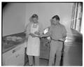 Students washing dishes in the new men's residence co-op, September 1954