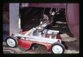 Lawn mower used for clipping on field burner (thermal sanitizer), Oregon, June 1971