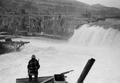 Man fishing at Celilo Falls on the Columbia River