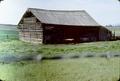 General view, front of Log Barn from State Highway 82