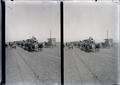 "Oregon Cavalcade," line of wagons on road