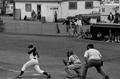 Batter swinging at the ball