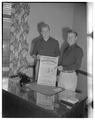 Dads Day committee chairman with Jim Hanker, student body president, left, December 1949