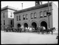 Fire Department at Walla Walla, WA., with horse-drawn pumper and ladder trucks, and fire engine in front of building.