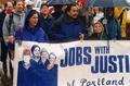 "Jobs with justice" banner