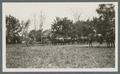 Horse-drawn artillery caissons/limbers on campus, circa 1920