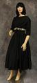 Dress of black silk taffeta faille with wide scoop neckline and bracelet-length raglan sleeves