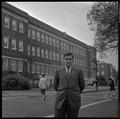 Gary Ford, a member of OSU's G.E. College Bowl team, posing outside of the Commerce Building