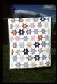 65 x 75 star quilt made with feed sack backs and nurses uniforms front, Marguerite Jensen made it, sister was the nurse! Around 1941 or 1942 or so here in Junction City