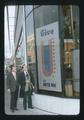 Jerry Weiler and John Stolsenberg with United Way fundraising thermometer, Corvallis, Oregon, 1974