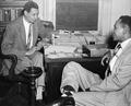 Edwin C. Berry counsels with a young student
