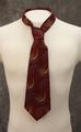 Tie of dark red wool challis with abstract print