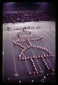Oregon State University Marching Band forming the shape of a woman in a skirt, circa 1969