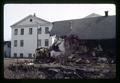 Bulldozer wrecking apartments, Corvallis, Oregon, April 1971