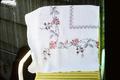 French knot embroidered bridge cloth made by Betty Jane Muckleroy in about 1932 in Wichita, Kansas. 36 inch square.