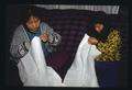 Master Artist Khen Chiem Saepharn working with Apprentice Meuy Fow Saephan on Mien embroidery (TAAP 1992-93)