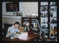 Student studying in fisheries laboratory, 1966