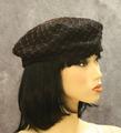 Cap or beret-style hat of black felt