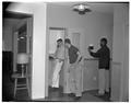 Using the phone in the new men's residence co-op, September 1954