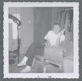 Cadet in hotel room while at drill team competition, November 1961